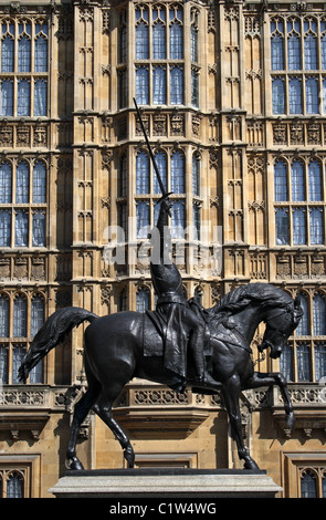 The statue of King Richard I, or Richard the Lionheart, outside the Houses of Parliament in London, England. Stock Photo