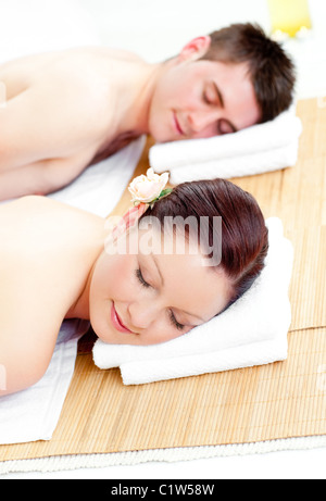Resting couple lying on a massage table Stock Photo