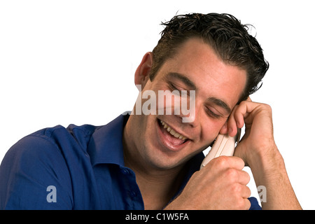 Man having a fun conversation on the phone. Stock Photo