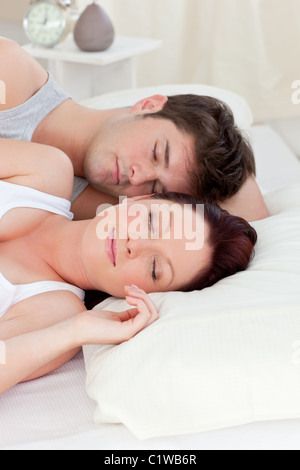 Young couple sleeping in bed Stock Photo