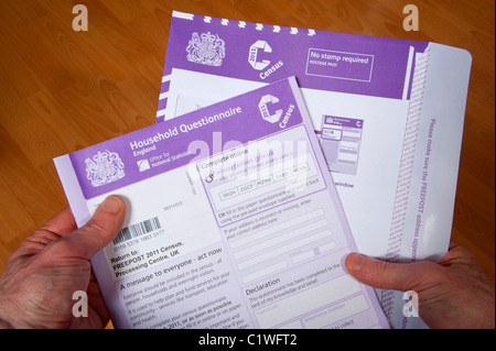 person filling in 2011 uk government census form Stock Photo