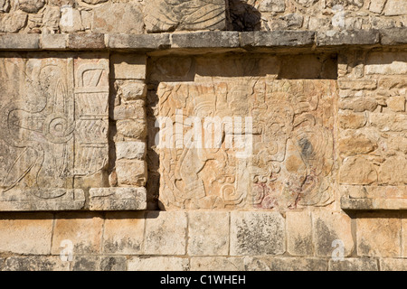 Stone relief of Quetzalcoatl-Kukulkan as the 'Morning Star' on the side panel of the Venus Platform in Chichen Itza, Mexco.
