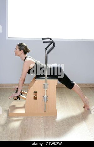 combo wunda pilates chair woman instructor fitness yoga gym exercise. Copy  space. sports banner Stock Photo - Alamy