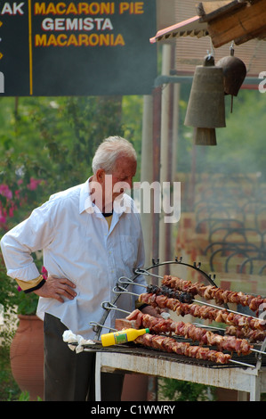 Chef in front of his diner, waiting for guests, sign chicken kebab Stock Photo