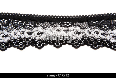 Black lace with pattern in the manner of white flower on white background Stock Photo