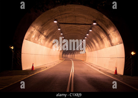 Road to the old tunel at night Stock Photo