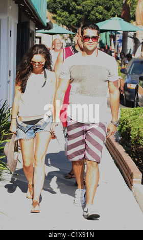 Jesse Metcalf with a girl and his bodyguard, at Malibu Howdy's Sushi