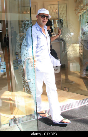 Billy Zane and his girlfriend shop in Beverly Hills on bicycles Los Angeles, California - 22.08.09 / Stock Photo