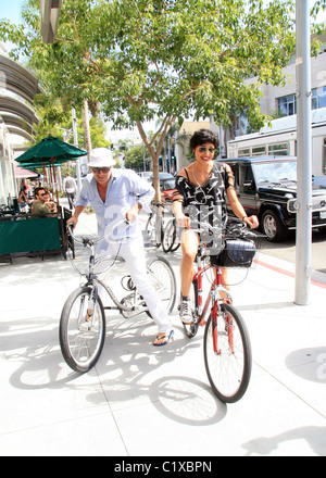 Billy Zane and his girlfriend shop in Beverly Hills on bicycles Los Angeles, California - 22.08.09 / Stock Photo