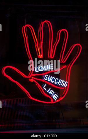 Palm reader neon sign Stock Photo