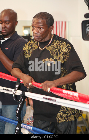 Boxer Floyd Mayweather Jr.talks to his father Floyd as he works out as he trains to face Juan Manuel Marquez at the MGM Grand Stock Photo