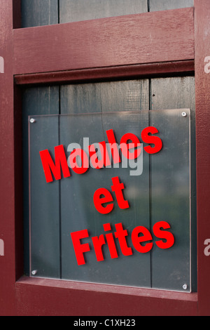 Sign advertising Moules et Frites at Restaurant in Bruges, Belgium Stock Photo