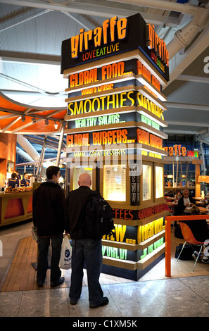 The Giraffe restaurant/cafe in terminal 5, heathrow airport London UK Stock Photo