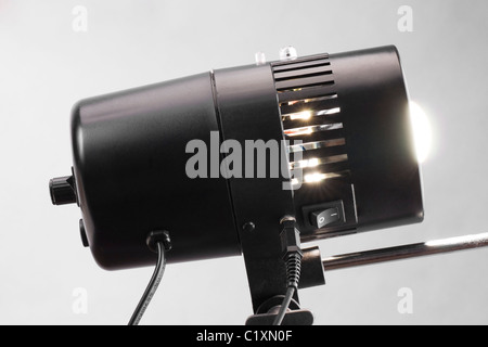 Professional black studio flash lamp close-up. Stock Photo