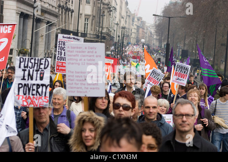 anti cuts anti-cuts march, march 26, protesters march with banners and placards Stock Photo