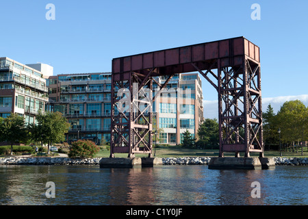 Bond Street Wharf office building and historic loading machinery, Baltimore harbour, Fell's Point, Maryland, USA Stock Photo