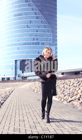 The young woman in downtown. Stock Photo