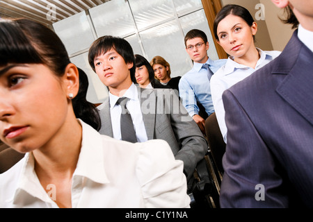 Image of confident people presenting at conference and listening to lecture Stock Photo