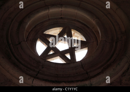 A pentagram is carved into a window at Alcobaca Monastery in Portugal. Stock Photo
