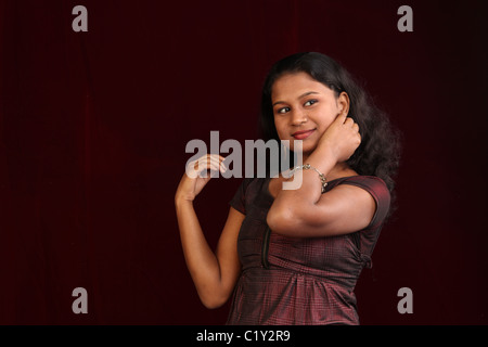 modeling port folio shoot inside a studio,with model in different poses Stock Photo
