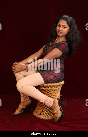 modeling port folio shoot inside a studio,with model in different poses Stock Photo
