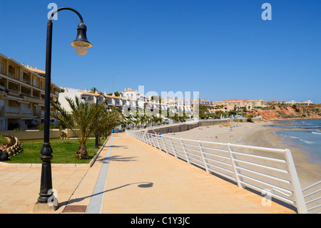 The promenade at Aguamarina Beach at Dehesa de Campoamor, Orihuela, Alicante province, Spain. Stock Photo