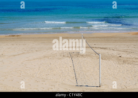 Volleyball net at Aguamarina Beach at Dehesa de Campoamor, Orihuela, Alicante province, Spain. Stock Photo