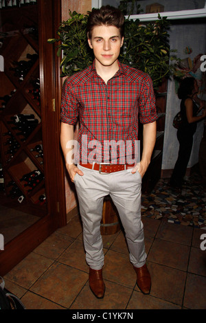 Nolan Gerard Funk attends the Fame-Wall world premiere launch party an inaugural portrait unveiling honoring John Stamos at Stock Photo