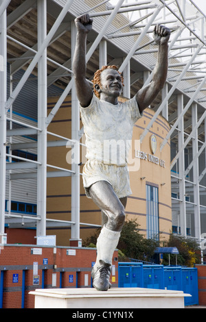 Statue of footballer Billy Bremner in front of The East Stand of Elland ...