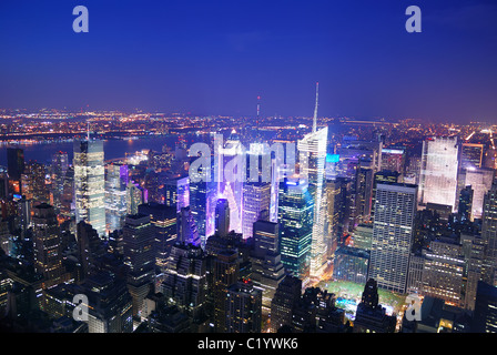 New York City Manhattan Times Square skyline aerial view panorama at night with skyscrapers and street. Stock Photo