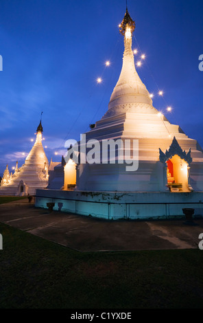 The chedis of Wat Phra That Doi Kong Mu on a hilltop at Mae Hong Son, Mae Hong Son province, THAILAND Stock Photo
