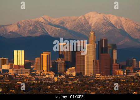 Downtown Los Angeles with the snow-covered San Gabriel Mountains in the background. California, USA. Stock Photo