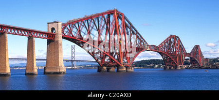 Historical Victorian Scotland Firth of Forth steel cantilever rail bridge & modern road bridge beyond South Queensferry view to North Queensferry UK Stock Photo