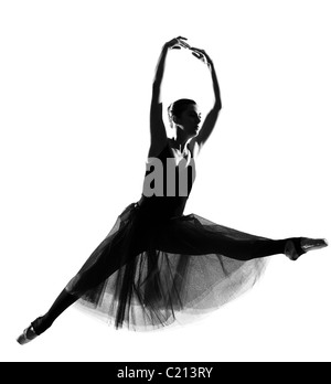 one beautiful caucasian woman ballet dancer dancing leap jumping full length on studio isolated white background Stock Photo