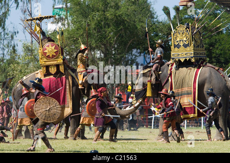 Ancient war re-enactment in Srinarong Stadium during the annual Surin Elephant Roundup festival.  Surin, Surin, Thailand Stock Photo