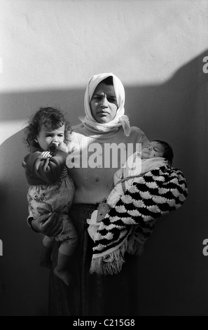 Jabalya Refugee Camp, Gaza 1988. Mother with her two children. Stock Photo