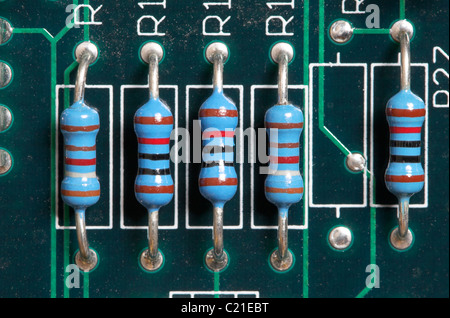 Resistors mounted on a printed circuit board. Stock Photo