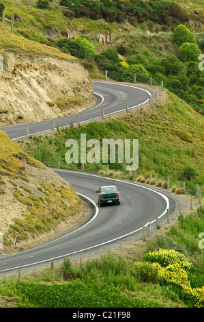 car on winding mountain road New Zealand Stock Photo