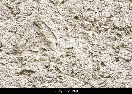 texture on the concrete and pebble render on the wall of a building. Stock Photo
