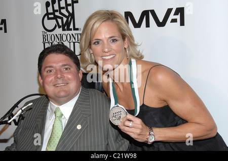 Dora Torres and Marc Buoniconti attends The 24th Annual Great Sports Legends Dinner to benefit The Buoniconti Fund to Cure Stock Photo