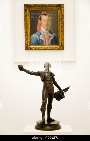 Statue and painting of renowned / famous bullfighter / Toreo / on museum tour. Sevilla bullring / bull ring. Seville. Spain Stock Photo