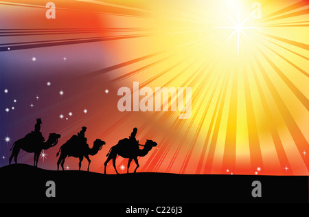 The three wise men crossing the desert following the star of Bethlehem in Christmas Nativity scene Stock Photo