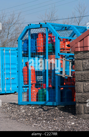 Cage Of Bottled Gas Stock Photo