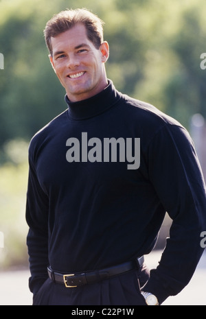 Portrait of good looking young guy, confident. Stock Photo