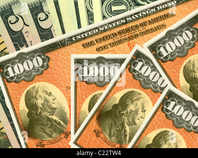 United States savings bonds and dollars. Paper $1000 United States savings bonds and dollars. Stock Photo