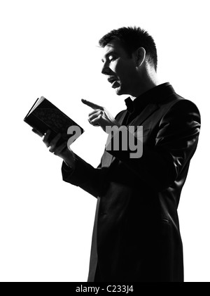 silhouette caucasian business man with note pad expressing behavior full length on studio isolated white background Stock Photo