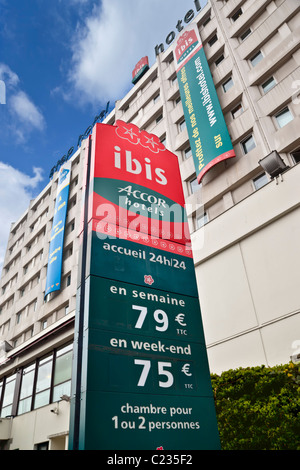 Ibis hotel sign outside a combined Accor hotel on the outskirts of Paris, France Stock Photo