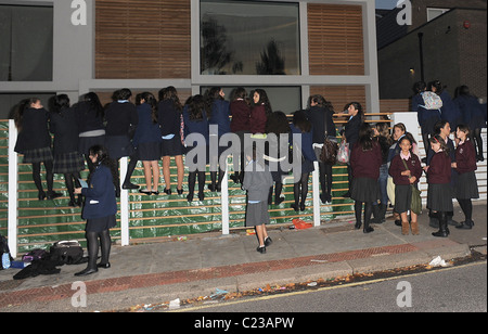 Scenes of chaos outside The X Factor House. Despite signs going up on the fence of the house, saying 'Attention. Anyone caught Stock Photo