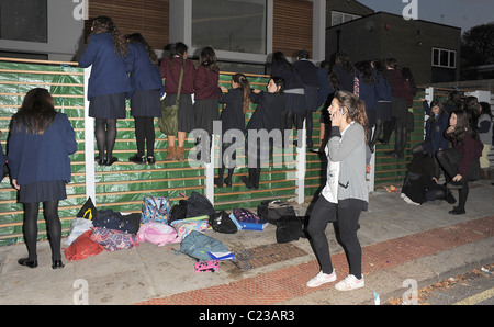 Scenes of chaos outside The X Factor House. Despite signs going up on the fence of the house, saying 'Attention. Anyone caught Stock Photo