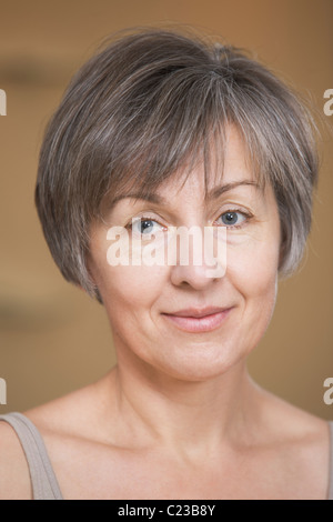 Portrait of mature woman with short grey hair wearing glasses Stock ...